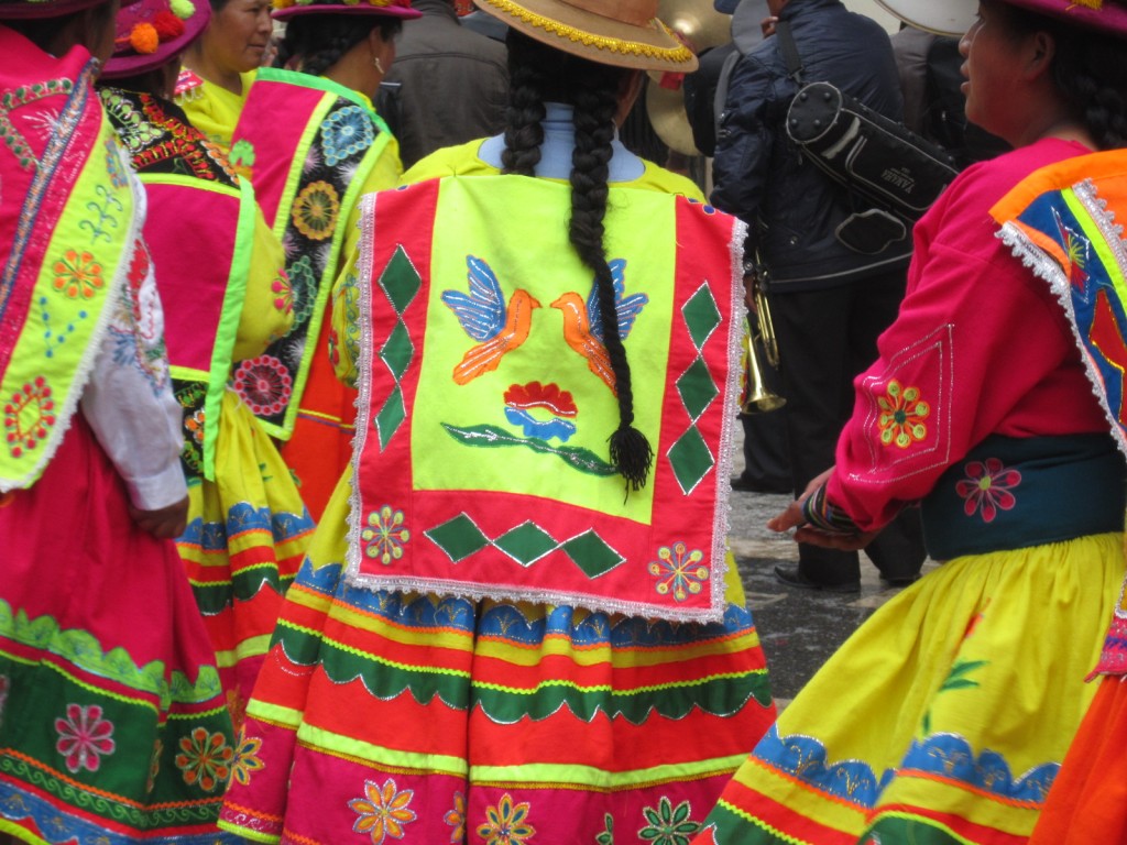 Dancers in the Puno Week celebrations wait for their turn to showcase their skills and tell their story. 