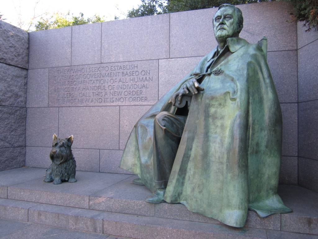 Statue of President Franklin Delano Roosevelt with his beloved dog, Falla at the FDR Memorial on Washington D.C.'s Tidal Basin