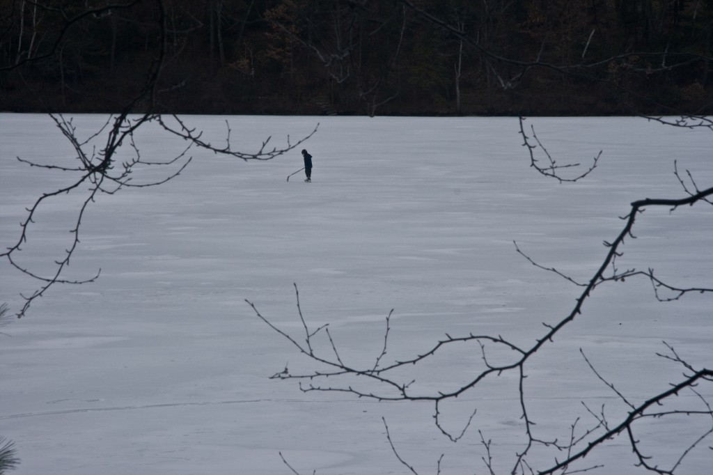 Children playing ice hockey on Walden Pond in Concord, Massachusetts